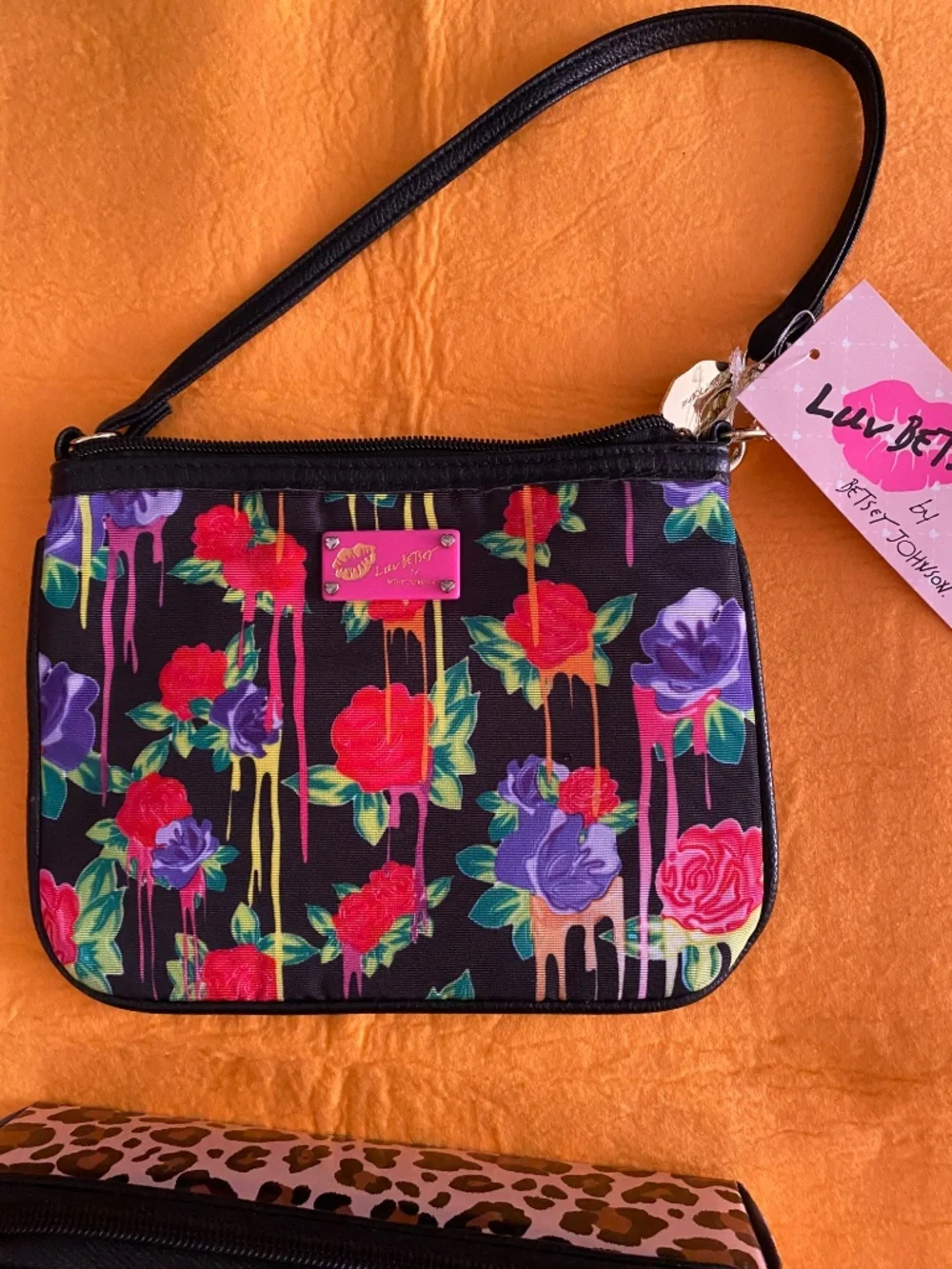 Luv Betsey zip around wallet & wristlet rose collection